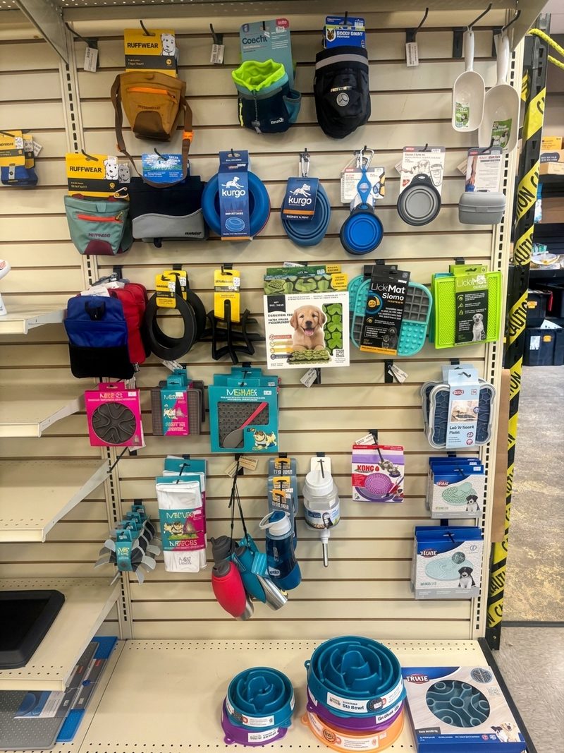 Treat pouches, collapsible bowls and slow feeders on slatwall